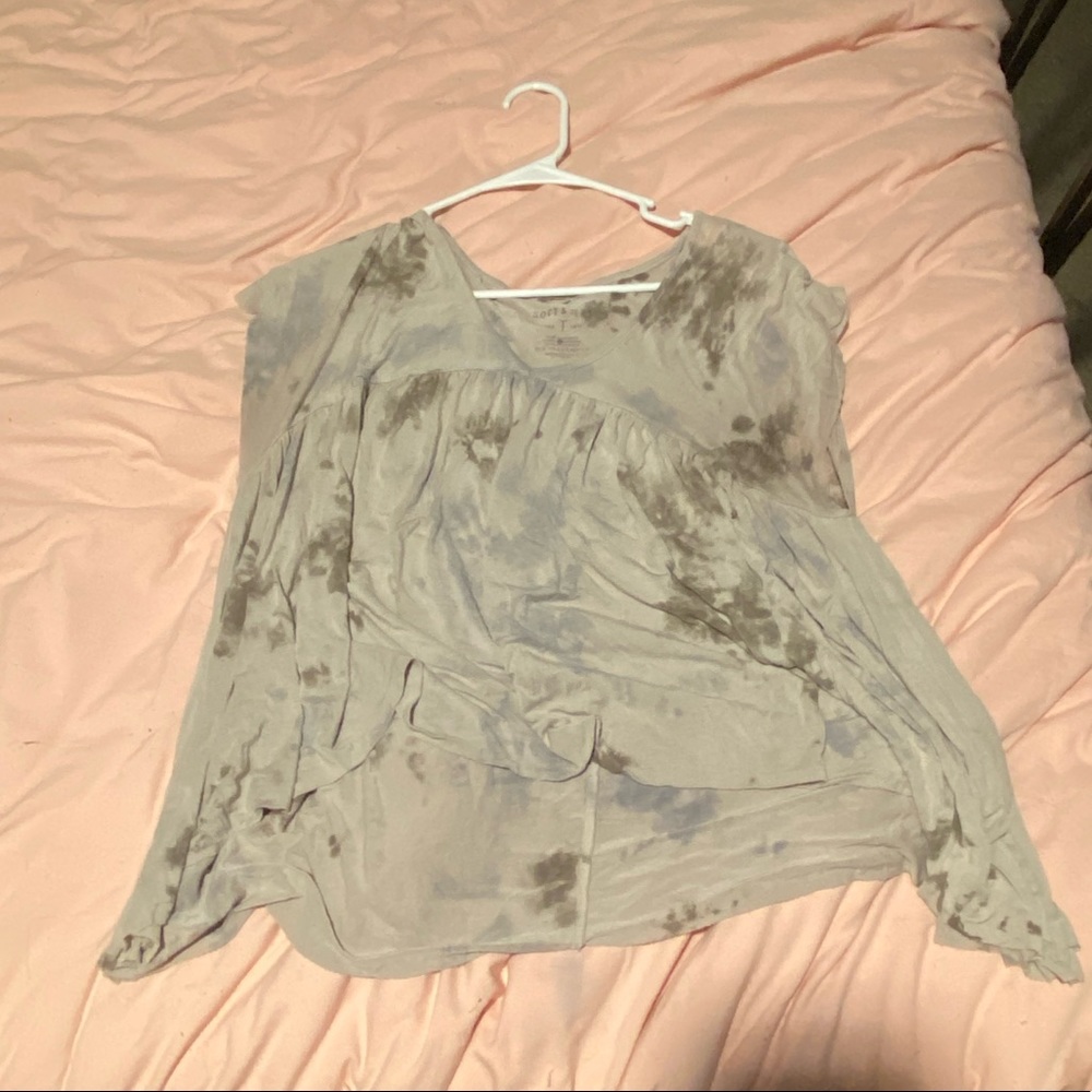 Loose fitting tan shirt